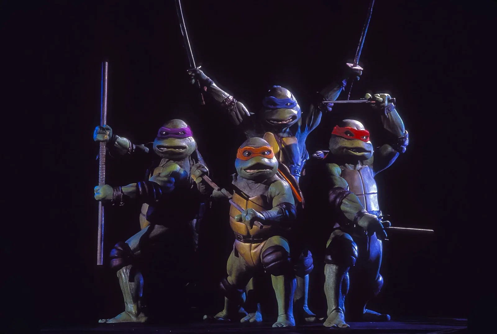 The four brothers, raised in hiding beneath the city.