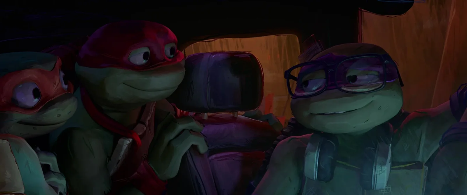 The Turtles stand back to back, ready for a fight.