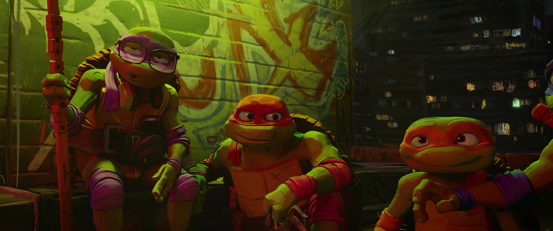 Three Turtles sit close together against a graffiti wall, leaning in with curious expressions in green-orange light.
