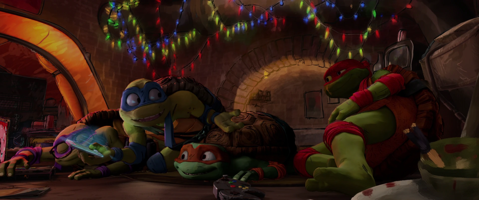 All four Turtles huddle on the sewer lair floor beneath colorful string lights strung along a brick arch.