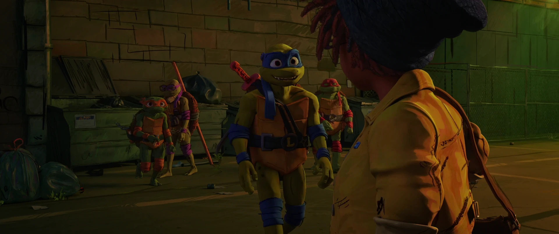 April stands at a school door as all four Turtles approach her from the shadowy alley at night.