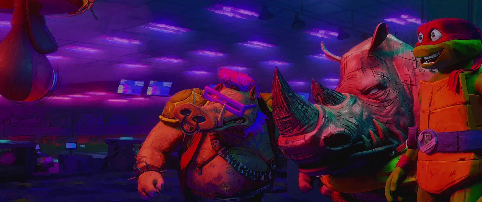 Bebop grins beside Rocksteady’s massive pink rhino head in purple arcade light, with Raph at the edge.