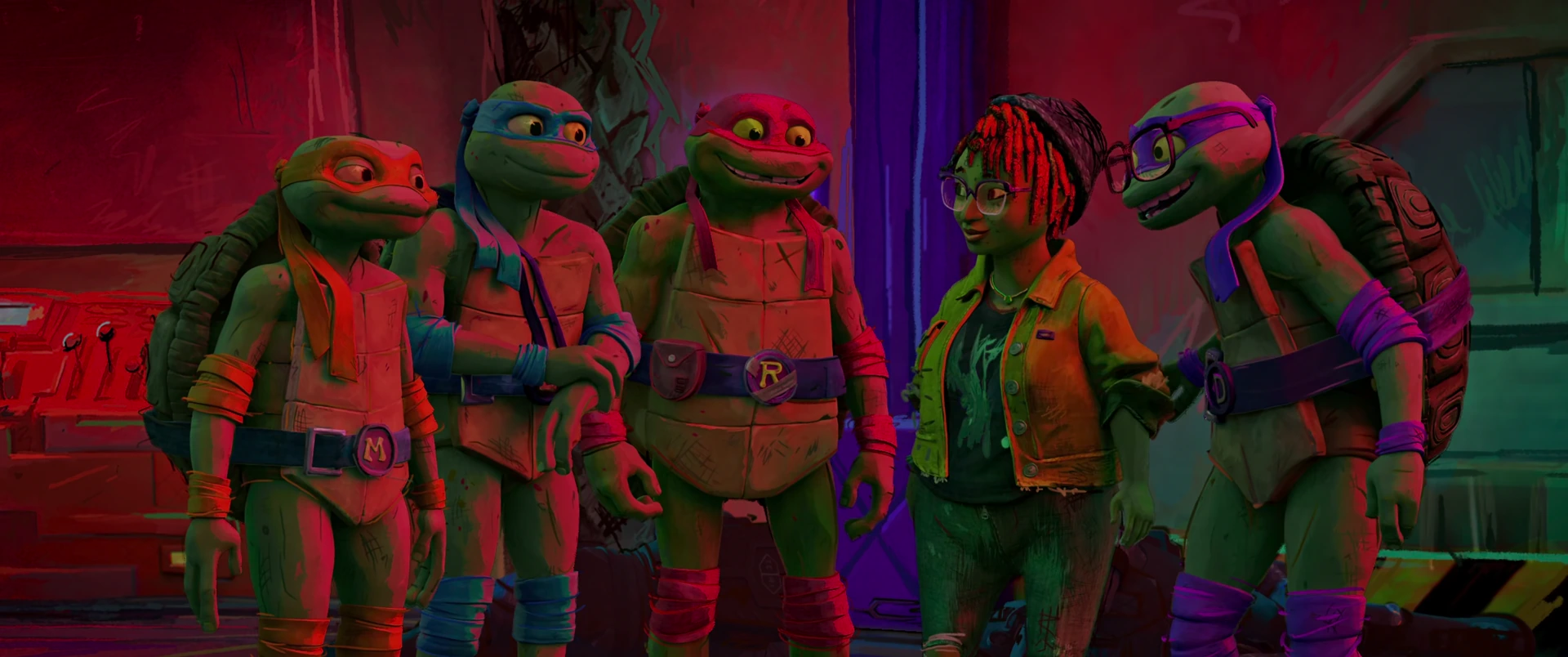 All four Turtles and April stand in a tense group facing someone off-screen under vivid red neon light.