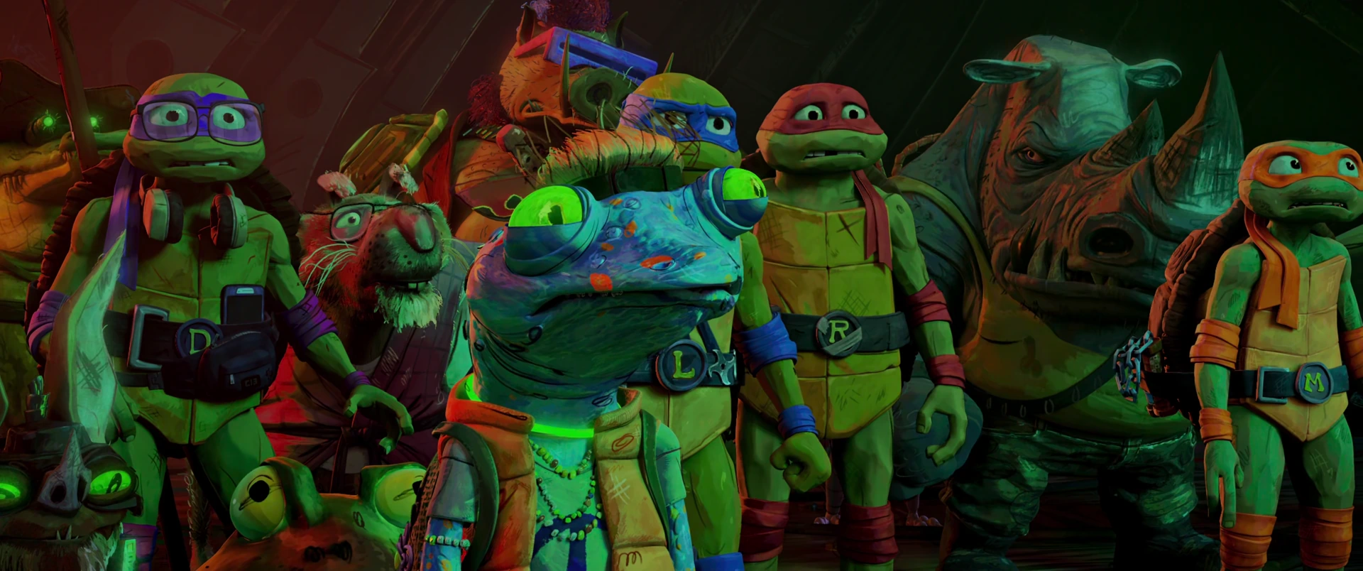 All four Turtles stand shoulder to shoulder with the mutant gang in vivid red-green light, united and defiant.