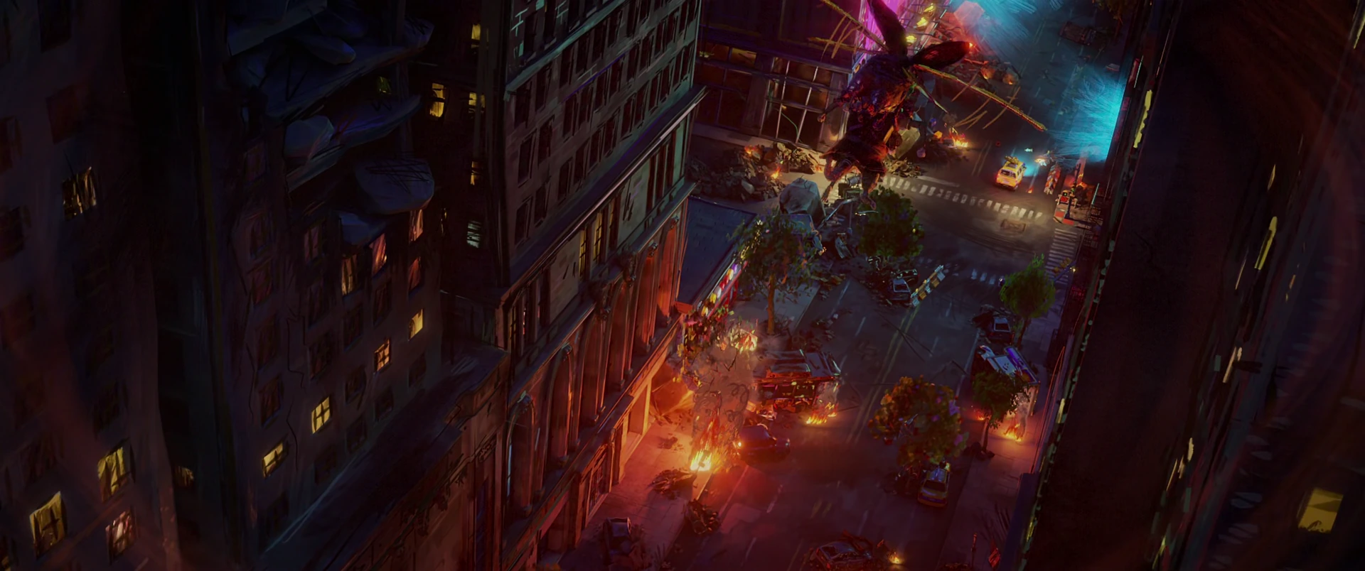 Bird’s-eye view of the kaiju looming over burning city blocks, tiny cars and flames scattered through the skyscraper canyon.