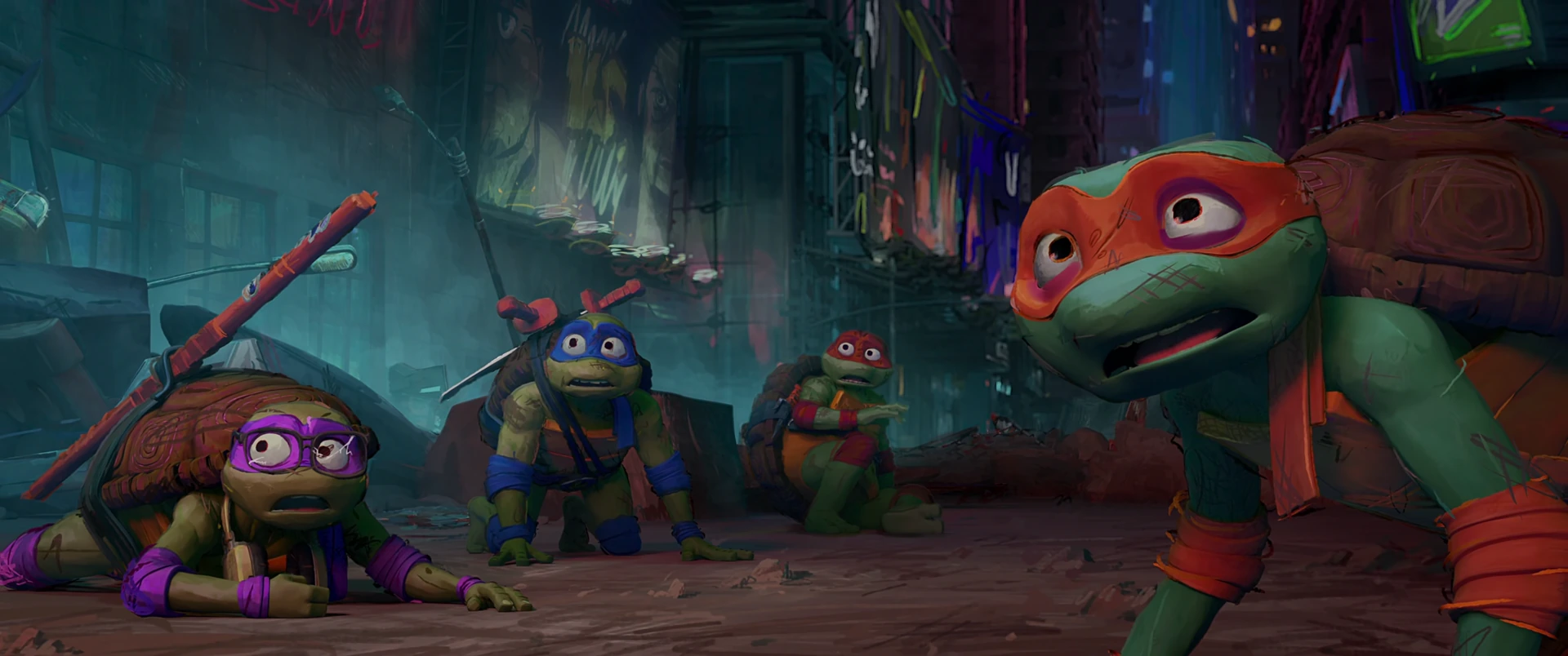 All four battered Turtles huddle together on the ground in exhausted relief after defeating the kaiju.