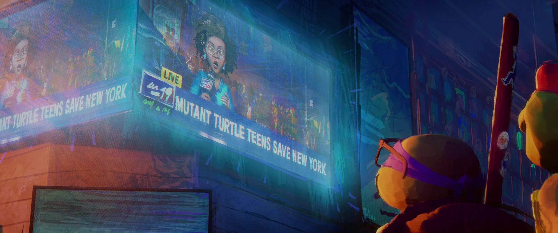 Donatello and Michelangelo look up at a giant Times Square screen reading MUTANT TURTLE TEENS SAVE NEW YORK.
