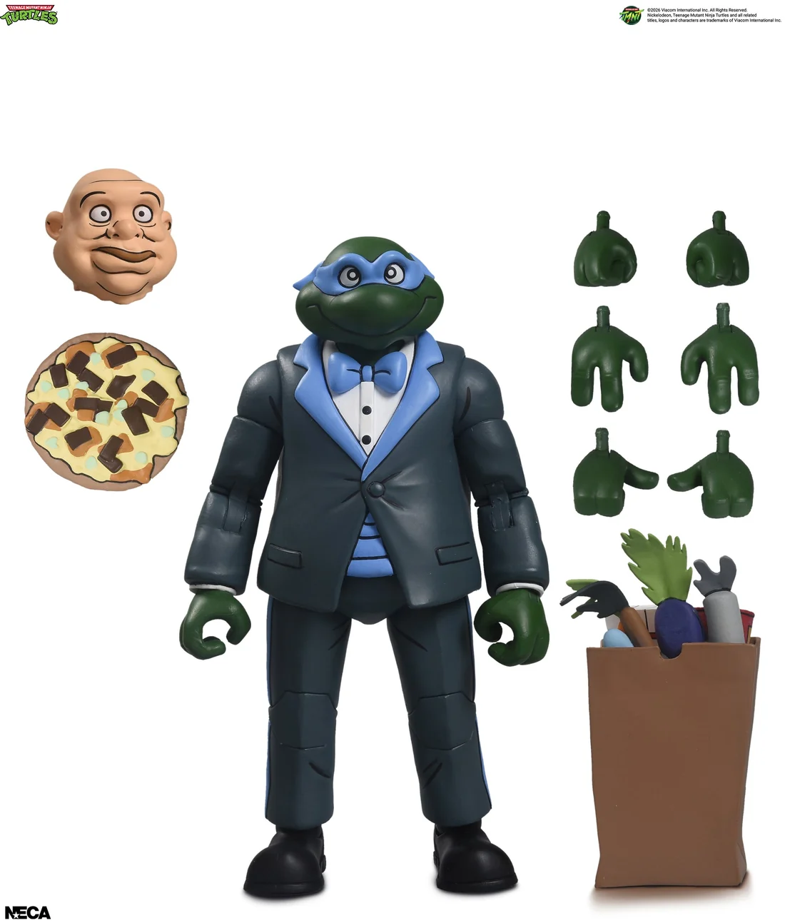 The Tuxedo Leo accessory layout on white, with a bald rubber human mask, six hands, a sack of groceries and a pizza.